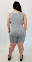 Load image into Gallery viewer, Back view of a size 16 Pretty Little Thing light heather gray sleeveless unitard styled with black slide sandals on a size 14/16 model.