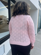 Load image into Gallery viewer, Back view of a soft pink Eloquii sweater in a size 18/20 on a size 16/18 model. No ruffle detail on the back. 
