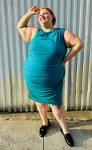 Load image into Gallery viewer, Full-body front view size 24 Lane Bryant teal sleeveless midi dress styled with black loafer slides on a size 22/24 model. The photo is taken outside in natural lighting.
