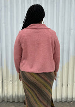 Load image into Gallery viewer, Back view of a LIVD Apparel size 1X dusty rose fuzzy collared crop jacket styled open over a white ribbed tank and earth tone striped skirt on a size 14/16 model. The photo is taken outside in natural lighting.
