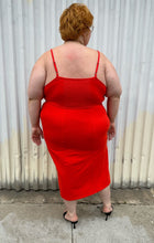 Load image into Gallery viewer, Full-body back view of a size 3X Amazon The Drop x Kellie B collab bright red tank dress with pockets styled with black kitten heels on a size 22/24 model. The photo was taken outside in natural lighting.
