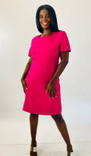 Load image into Gallery viewer, Additional full-body front view of a size 16 Kasper vintage hot pink short sleeve shift dress with embroidered floral details and white strappy sandals on a size 12 model.
