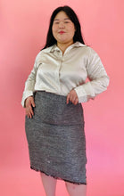 Load image into Gallery viewer, Additional front view of a size 14 Maria Cornejo for 11 Honoré off-white/cream collared button-up blouse styled with a gray textured skirt on a size 14/16 model.

