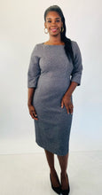Load image into Gallery viewer, A size 16 Michael Kors dark gray and silver metallic textured three-quarter sleeve midi dress styled with black pumps on a size 12 model.
