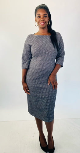 A size 16 Michael Kors dark gray and silver metallic textured three-quarter sleeve midi dress styled with black pumps on a size 12 model.