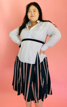 Load image into Gallery viewer, Additional front view of a size L TOME for 11 Honoré white, green, blue, red, and black mixed pinstripe and triple stripe collared button-up shirt dress with tie belt on a size 14/16 model.
