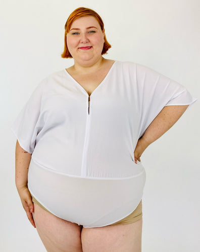 A size 3 Fashion to Figure x Sarah Rae Vargas crisp white wide-sleeved bodysuit with stretch at the bottom on a size 22 model.