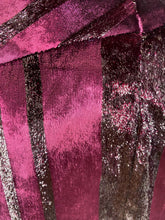 Load image into Gallery viewer, Additional close-up view of the maroon-purple velvet material of a size 12 Parker NY for 11 Honoré maroon-purple velvet shift midi dress with asymmertical handkerchief hemline. The photo is taken inside in studio lighting.
