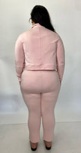 Load image into Gallery viewer, Full-body back view of a size 1 11 Honoré baby pink two-piece lounge set sold as is with some pen marks styled with black slides on a size 14/16 model.
