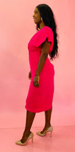 Load image into Gallery viewer, Full-body side view of a size 12 hot pink sheath dress with knotted torso detail, flutter sleeves, and fabric buttons at the hem styled with tan pumps on a size 10/12 model.

