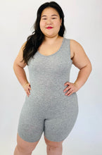 Load image into Gallery viewer, A size 16 Pretty Little Thing light heather gray sleeveless unitard on a size 14/16 model.
