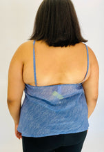 Load image into Gallery viewer, Back view of a size 2X Savage x Fenty light blue &quot;denim&quot; patterned camisole with black lace bust detail styled with black pants on a size 18 model.

