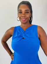 Load image into Gallery viewer, Close-up of the bodice of a size 14/16 Milly for 11Honoré cobalt blue a-line sleeveless mini dress with twisted neckline on a size 12 model.
