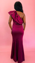 Load image into Gallery viewer, Full-body back view of a Zac Posen plum colored one-shoulder ruffle detail full-length evening gown on a size 10/12 model.
