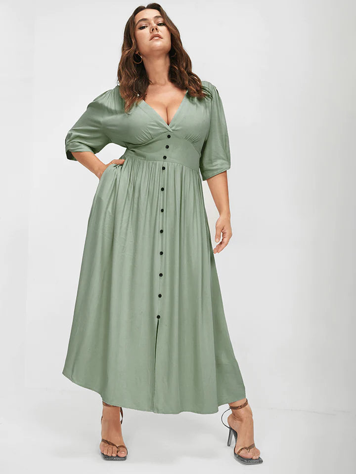 BLOOMCHIC DRESS WITH PLUNGING NECKLINE POCKETS AND BUTTON-DOWN FRONT OF DRESS