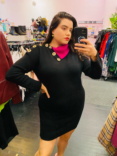Front view of a size L Marc Jacobs black sweater dress with magenta fold-over collar and gold hardware buttons on a size 14/16 model.