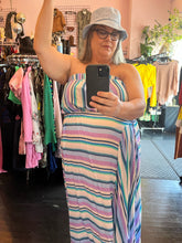 Load image into Gallery viewer, Additional front view of a size 22/24 Swimsuits for All blue, teal, purple, and white multi-stripe strapless maxi dress with drawstring bust detail styled with an eyelet bucket hat on a size 20/22 model.
