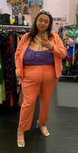 Load image into Gallery viewer, Full-body front view of a size 4X Wild Fable purple sparkly spaghetti-strap crop top styled with a peach blazer and trousers on a size 22/24 model.
