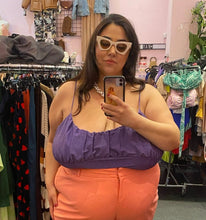 Load image into Gallery viewer, Additional front view of a size 4X Wild Fable purple sparkly spaghetti-strap crop top styled with peach trousers on a size 22/24 model.
