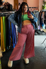 Load image into Gallery viewer, Full-body front view of a size 18 ASOS kelly green crop top with gathered straps styled under a medium wash denim jacket with pink and maroon gingham plaid trousers and white crocs on a size 18/20 model.
