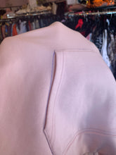 Load image into Gallery viewer, Close up of a pen mark around the pocket of a size 1 11 Honoré baby pink two-piece lounge set sold as is.
