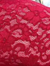 Load image into Gallery viewer, Close up view of the vibrant red floral lace of a size 2 (18/20) Kiyonna bright red all-over lace bodycon dress with v-neck and scalloped edge.
