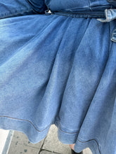 Load image into Gallery viewer, Close view of the light to medium wash ombré of a size 3 Fashion to Figure x Patrick Starrr lightwash to mediumwash ombré denim belted mini dress with collar and hook-and-eye bust detail on a size 22/24 model.
