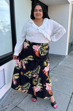 Load image into Gallery viewer, Full-body front view of a size 4X SHEIN white sheer-leaning blouse with ruffled eyelet collar, all-over swiss dots, and smocked cuffs styled with a black wrap skirt and black heels on a size 18/20 model.
