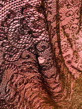 Load image into Gallery viewer, Detail shot of a small hole in the lace train of the gown.
