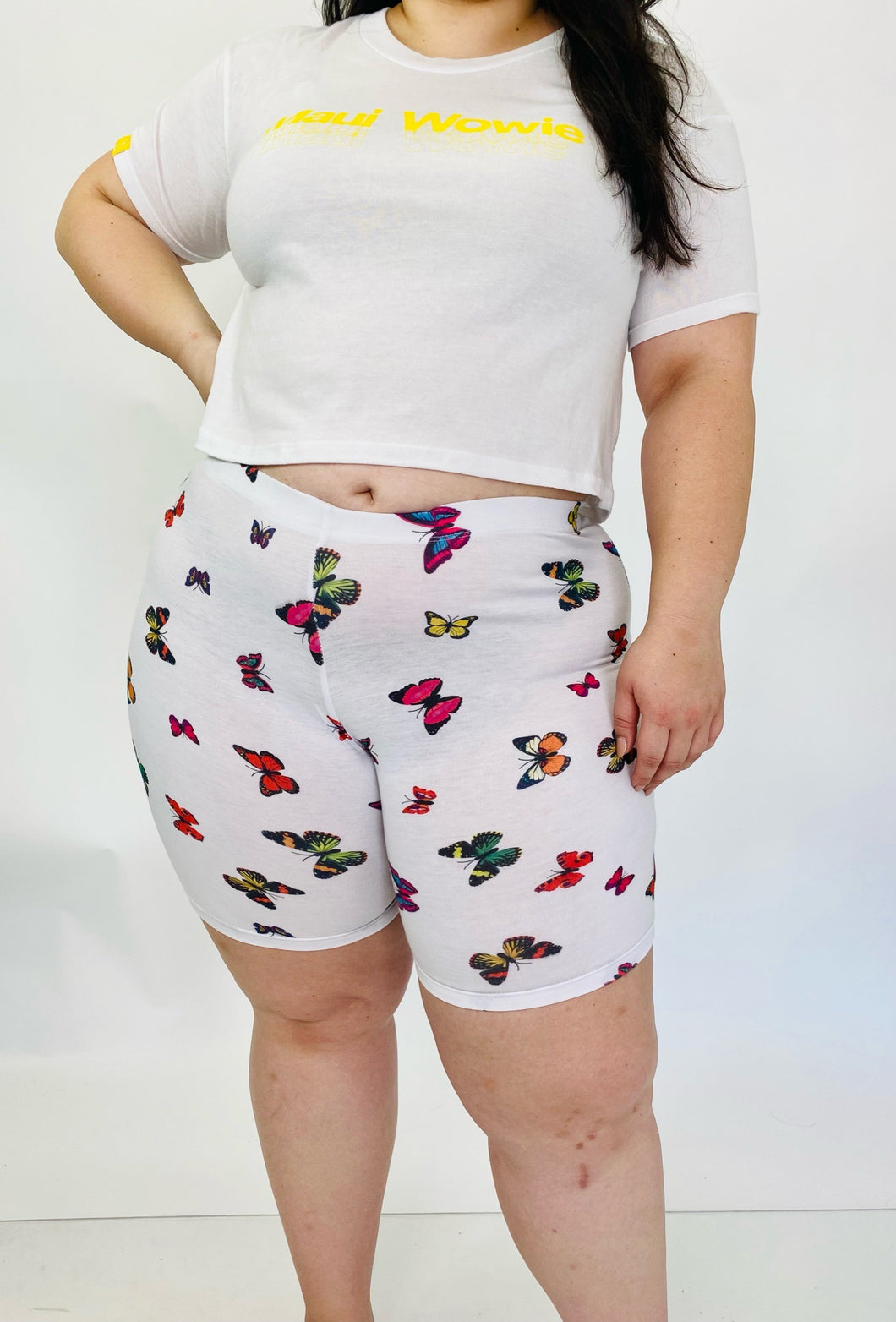 Fashion Nova White Bike Shorts with Colorful Butterfly Pattern