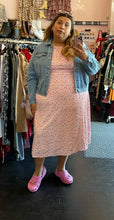 Load image into Gallery viewer, Full-body front view of a size 22 Glamorous Curve white midi dress with baby pink and red polka dot and heart mixed print styled under a lightwash denim jacket with pink crocs on a size 20/22 model.
