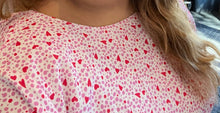 Load image into Gallery viewer, Close up of the super cute pink and red mixed polka dot and heart pattern on this size 22 Glamorous Curve midi dress.

