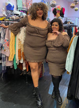 Load image into Gallery viewer, Full-body front view of a size 18 and a size 16 Pretty Little Thing neutral tone brown smocked-body off-shoulder-optional mini-midi dress with ruffle details and a bell sleeves styled with black shoes on a size 16/18 and 14/16 model, respectively.

