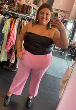 Load image into Gallery viewer, Full-body front view of a size 4X Cider black reptile burnout print cropped tube top styled with cropped pink trousers on a size 18/20 model.

