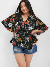 Load image into Gallery viewer, BLOOMCHIC WRAP STYLE BELTED V NECK WITH FLORAL DESIGN ON SOLID COLOR BACKGROUND

