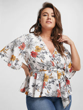 Load image into Gallery viewer, BLOOMCHIC WRAP STYLE BELTED V NECK WITH FLORAL DESIGN ON SOLID COLOR BACKGROUND
